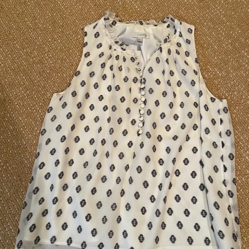 White silk sleeveless blouse
